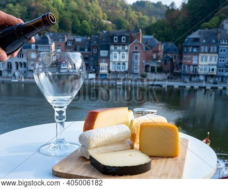 Pouring Of Belgian Abbey Beer And Tasting Of Cheeses Made With Trappist Beer And Fine Herbs With Vie