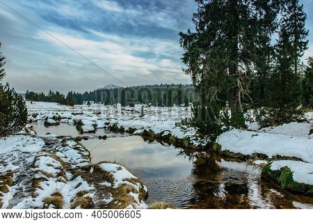 Winter View Of Mountain Landscape, Fresh Cold Stream And Large Meadow At Jizerka Settlement,czech Re