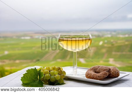 Tasting Of French Sparkling White Wine With Bubbles Champagne On Outdoor Terrace With View On Grand
