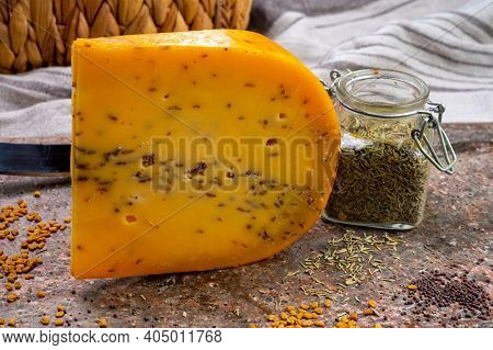 Cheese Collection, Piece Of Hard Yellow Dutch Gouda Cheese With Dried Caraway Or Cumin Seeds