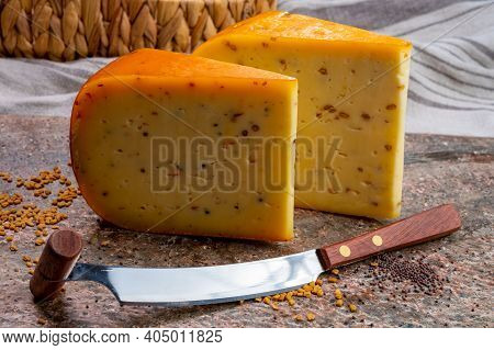 Cheese Collection, Pieces Of Hard Yellow Dutch Gouda Cheese With Dried Caraway, Mustard, Cumin, Fenu