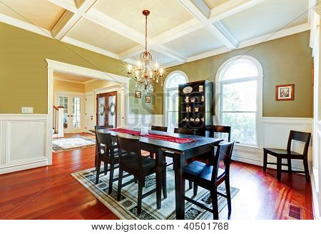Luxury Elegant Green Dining Room With Cherry Floor.