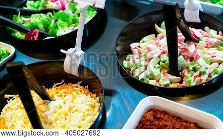 Salad Bar Buffet At Restaurant. Fresh Salad Bar Buffet For Lunch Or Dinner. Healthy Food. Celery And