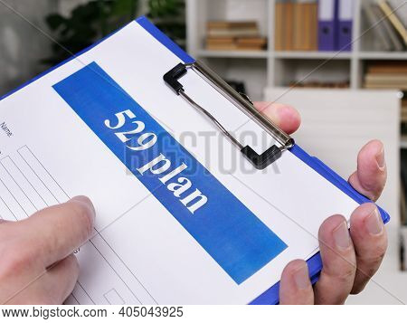 529 Plan Empty Application In The Hands. Saving For College Concept.