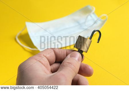 End Of World Isolation Of Pandemic. World Is Open After Coronavirus Quarantine. Open Lock With Key I