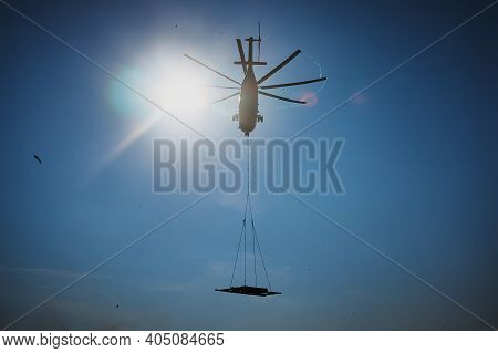 The World's Largest Cargo Helicopter Hovers Overhead. Bottom View