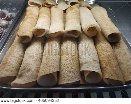 Patishapta Pitha In Bengal Made Of Rice, Filling Up With Coconut Kheer And Jugglery. It Is Very Test