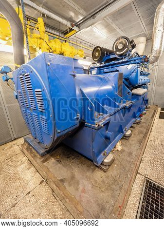 Engine Of A Cogeneration Unit Burning Residual Methane From A Wastewater Treatment Plant. Waste Biog