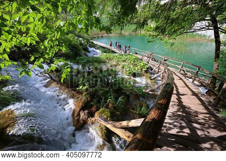 Plitvice, Croatia - June 15, 2019: People Visit Plitvice Lakes National Park (plitvicka Jezera) In C