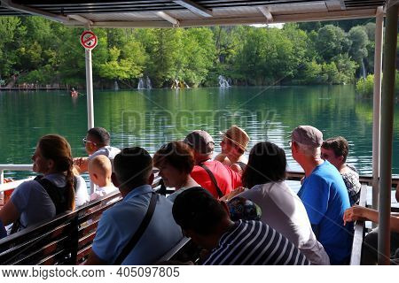 Plitvice, Croatia - June 15, 2019: People Take Part In Boat Tour Of Plitvice Lakes National Park (pl