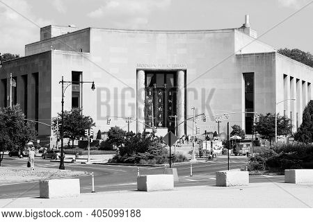 New York, Usa - July 6, 2013: People Walk By Brooklyn Public Library In New York. The Library Was Es