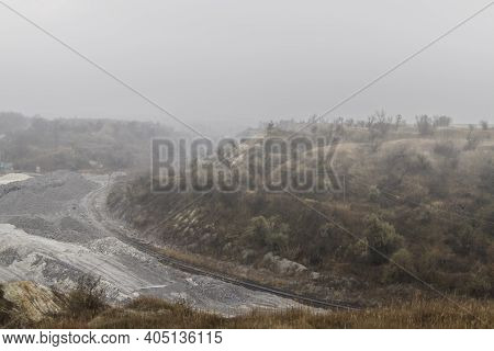 Clay Quarry In The Fog