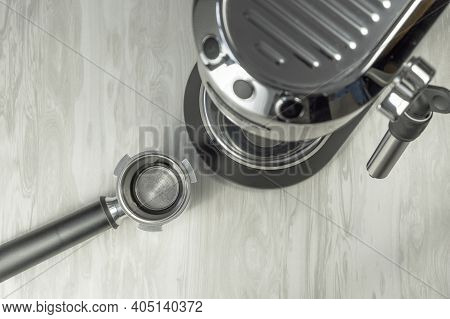 Top View Of Empty Coffee Maker Portafilter Before Making Espresso Coffee. Tools And Equipment For Pr