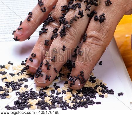 Photo Of A Hand More Black Lettered With White Background