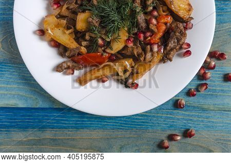 Baked Veal With Tomato Decorated With Herbs And Pomegranates Caucasian Cuisine Of Odjakhuri