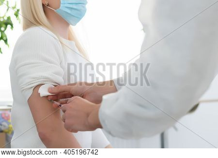 Doctor Injecting Vaccine To Woman, Covid Vaccine