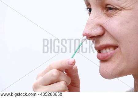 Herpes On The Nose - Pretty Young Woman Woman Holding An Ear Stick With Herpes Medicine. Human Virus