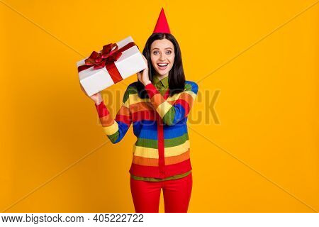 Photo Of Cheerful Happy Smile Young Girl Wear Party Hat Hold Gift Box Amazed Surprised Isolated Over