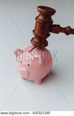 Wooden Gavel And Pink Piggy Bank. Vertical Image