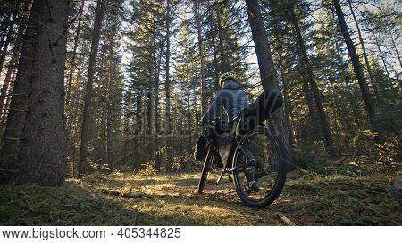 The Woman Travel On Mixed Terrain Cycle Touring With Bike Bikepacking. The Traveler Journey With Bic