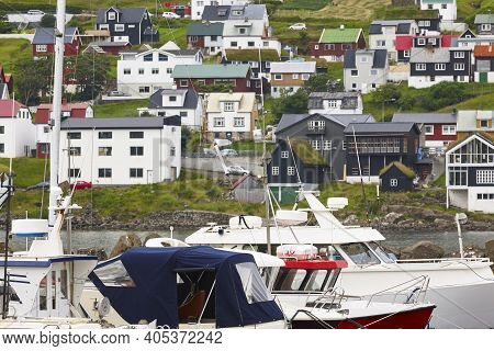 Picturesque Colorful Village And Harbor Of Sandavagur. Faroe Islands Landscape