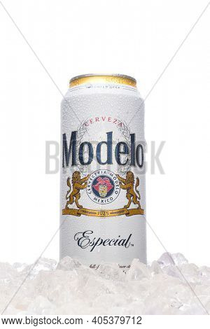 IRVINE, CALIFORNIA - MARCH 21, 2018: A Tecate Original Cerveza cans in ice. Cuauhtemoc Moctezuma Brewery is a major brewer based in Monterrey, Nuevo Leon, Mexico, founded in 1890.