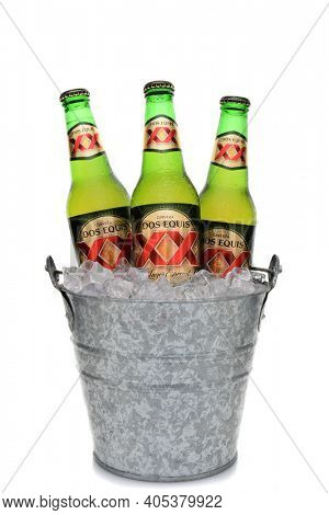 IRVINE, CA - MAY 25, 2014: Three Bottles of Dos Equis Lager Especial in a bucket of ice. 