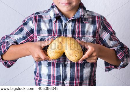 Trendy Ugly Vegetable, Human Lungs Shaped Potato In Hands