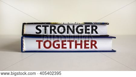 Stronger Together Symbol. Concept Words 'stronger Together' On Books On A Beautiful White Background