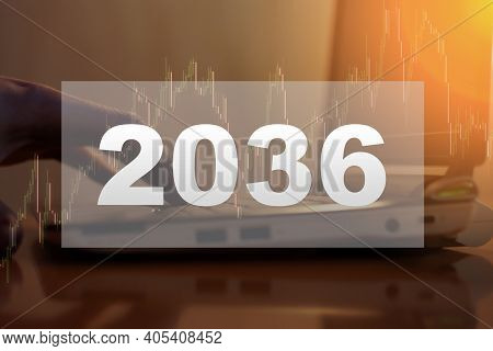 A Man In 2036 Works Online At A Computer From Home