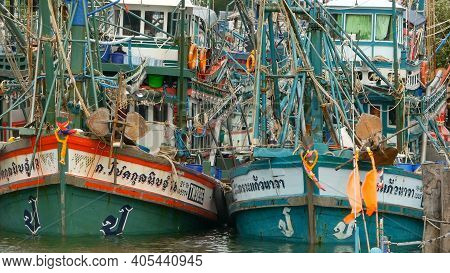 Khanom, Thailand - September 21, 2018. Rusty Boats At Coast. Old Rusty Ships Parked At Port In Fishe