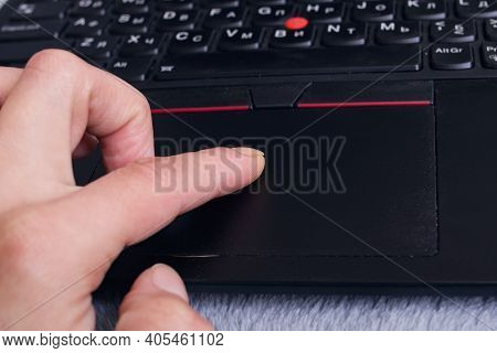 Belarus, Novopolotsk - 26 January, 2021: Hand And Black Lenovo Laptop Close Up