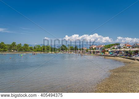 Zaton, Croatia, July 2019 Families Having Fun In Turquoise Coloured Waters Of Adriatic Sea With Rock