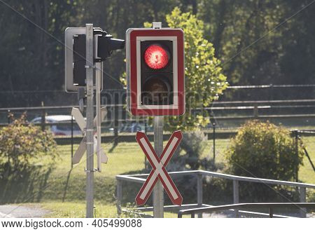 Ungated Railroad Crossing With Level Crossing Sign Or St. Andrew's Cross