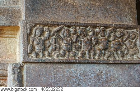 Aihole, Karnataka, India - November 7, 2013: Durga Gudi Or Temple. Gray Stone Row Or Line Of Human F