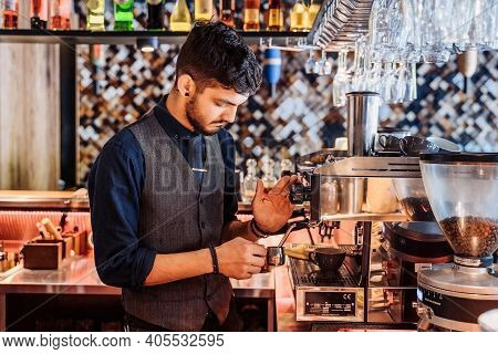 Close-up Of Barista Making Espresso From A Coffee Machine In A Restaurant, Bar Or Pub. Professional