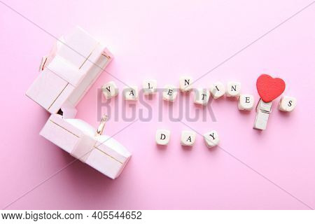Engagement Ring From The Combined Gold With Diamond In Gift Box On Pink Background.