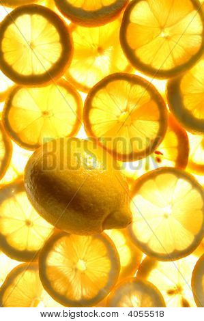 Lemon With A Background Of Lemon Slices