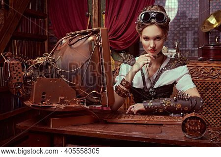 Beautiful steampunk lady scientist inventor works in her laboratory with Victorian interior. 
