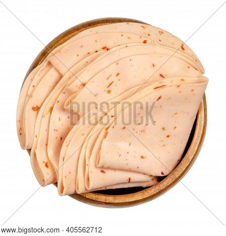 Cold Cut Vegetarian Chili Sausage In A Wooden Bowl. Thin Slices Of Meatless Extrawurst, Similar To B