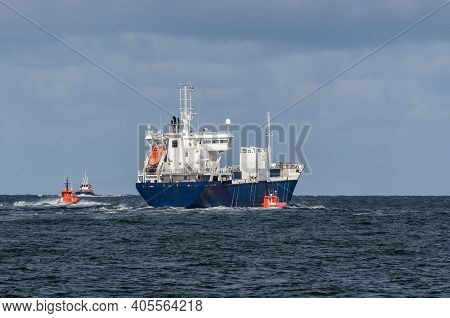 Merchant Vessel  - The Freighter Follows Waterway