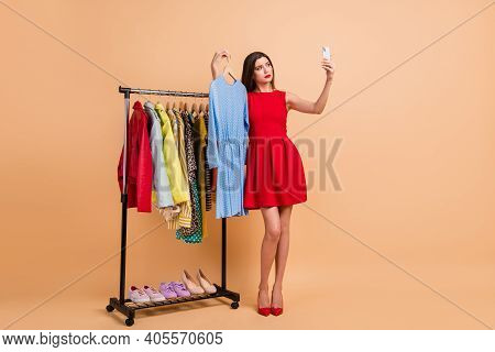 Full Length Photo Of Doubtful Girl Take Selfie Choose Dress Showroom Wear Red Stilettos Dress Isolat