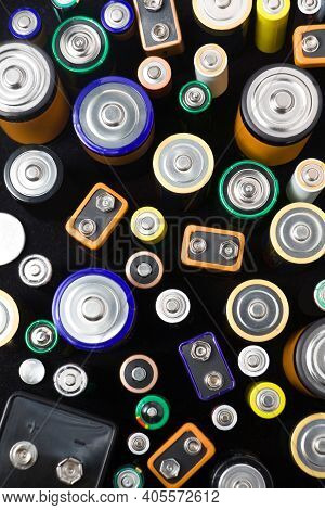 Overhead View Of Different Types Of Domestic Chargeable And Non Rechargeable Batteries