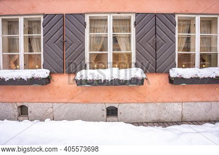 Finland, Helsinki. January 26, 2021 Windows And Facade Of An Old Building In Helsinki. Close-up. Hig