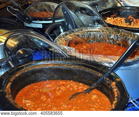 Potluck Dinner Ready To Be Served To Guest Indoors.