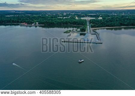 Panoramic Aerial View Of The Lower Park In Peterhof. Pier. The Gulf Of Finland. Summer. Green Trees.
