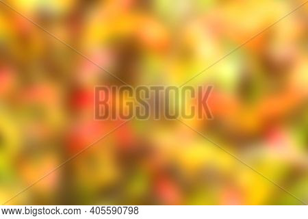 Blurred Abstract Vegetative Background Of Autumn Colors.