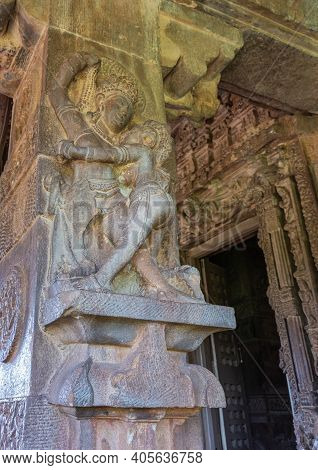 Aihole, Karnataka, India - November 7, 2013: Durga Gudi Or Temple. Gray Stone Love Embrace Of Man An