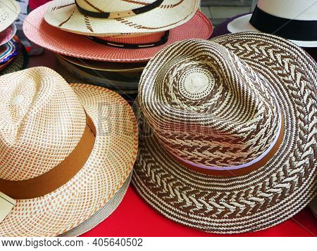 Colorful Handmade Panama Hats Or Paja Toquilla Hats Or Sombreros At The Traditional Outdoor Market I