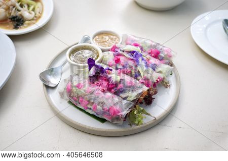 Beautiful And Delicious Thai Cuisine. Colorful Appitizers Made From Edible Flower Or Thai Name ( Mia